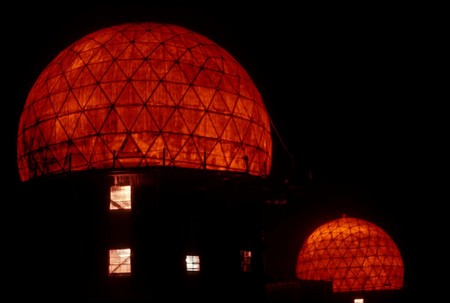 Radar towers at night