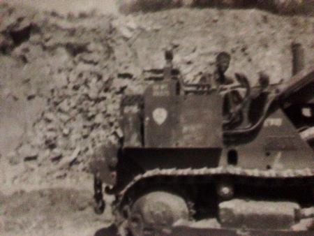 Operating my big toy and playing in the dirt