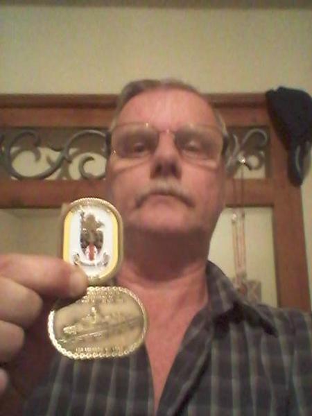 My Uss Pensacola challenge coins
