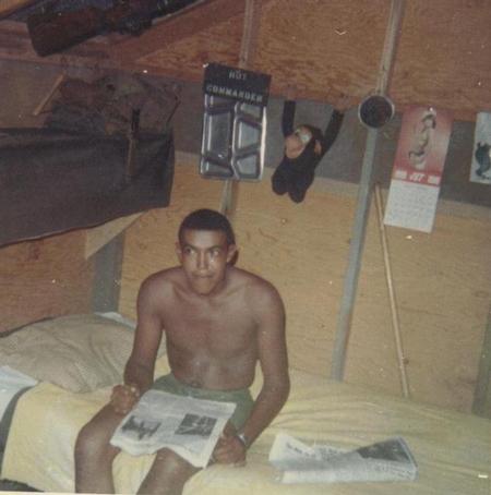 Reading The STARS & STRIPES.