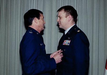 Being presented a Meritorious Service Medal