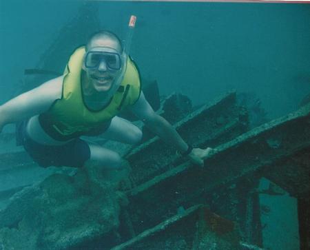 Me snorkeling on a sunken wreck