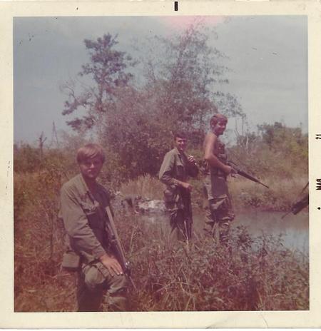 Water run from bomb crater for dog handler
