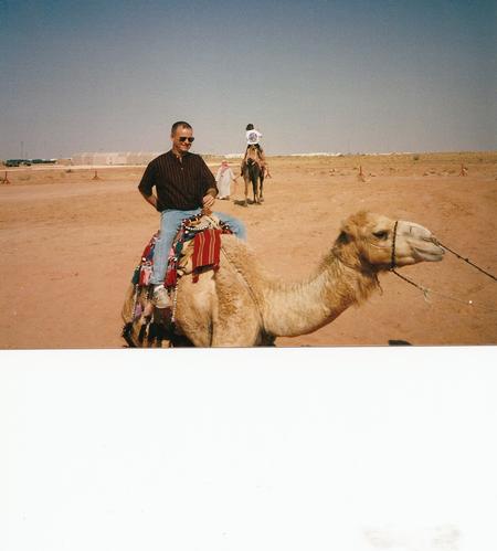 Riding a camel at the Bazzar