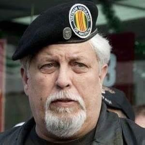 Photographers Mate 3rd class.