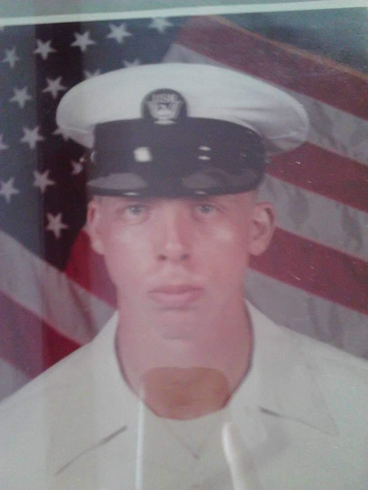 John Hughes wearing flack vest