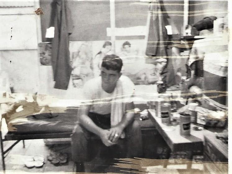 Lt Abodeely (standing, center, with sun glasses)